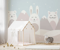 Soft pastel woodland creature wallpaper with layered hills.