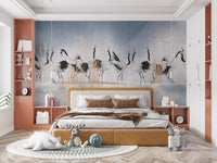 Large scale crane wall mural behind a double bed with brown linens.