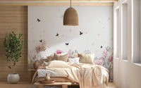 Serene Floral Orchard Wall Mural behind a wooden bed frame in a bright room