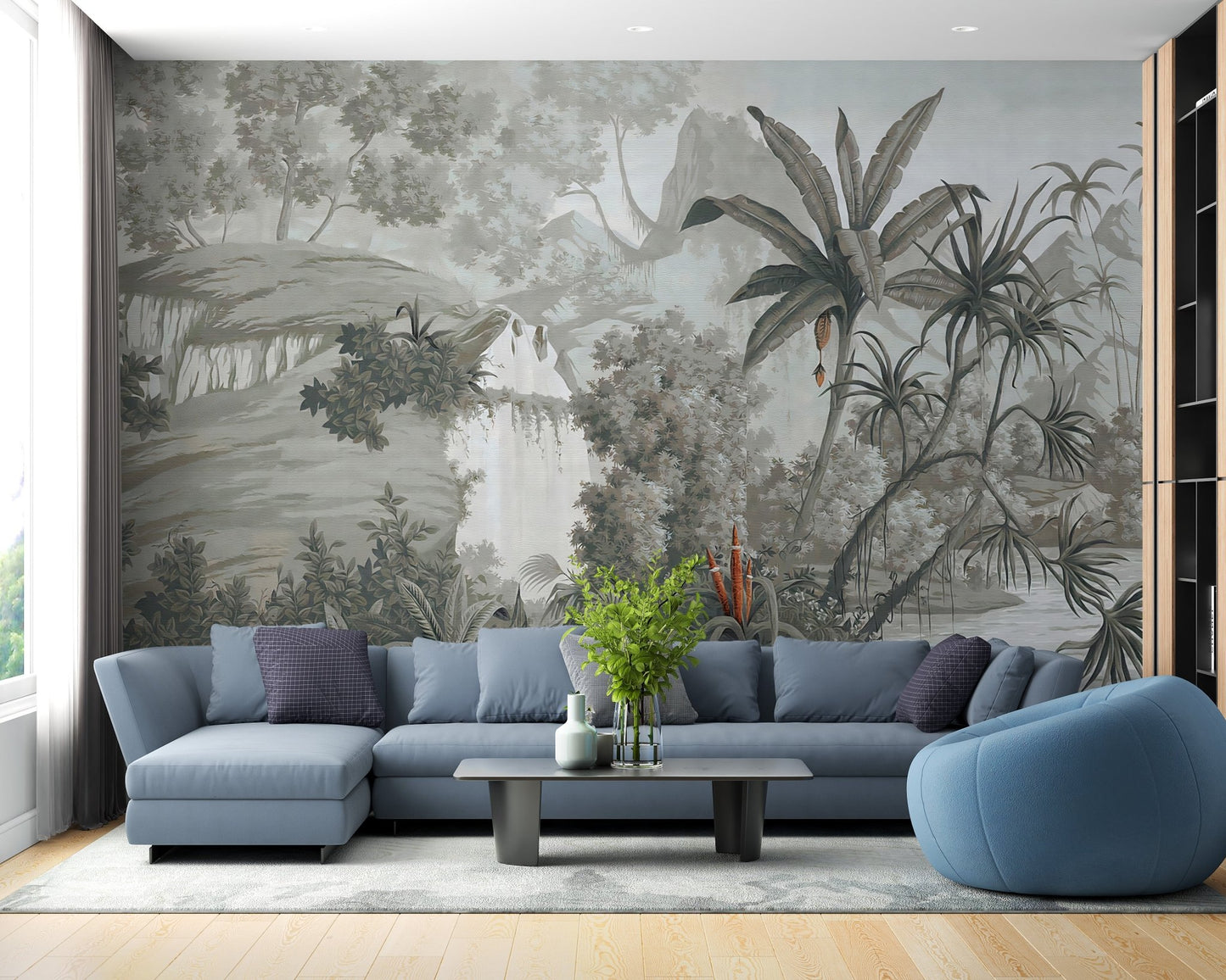 Grey botanical wallcoverings murals in a living space with a blue sectional.