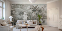 Grey tropical woodland wall mural featuring palm trees behind a white sofa in living room.
