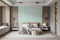 Botanical petals wallpaper as a bedroom feature wall.
