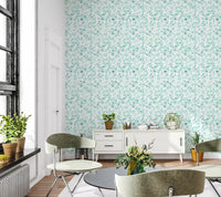 Teal petals wallpaper in a white dining room.