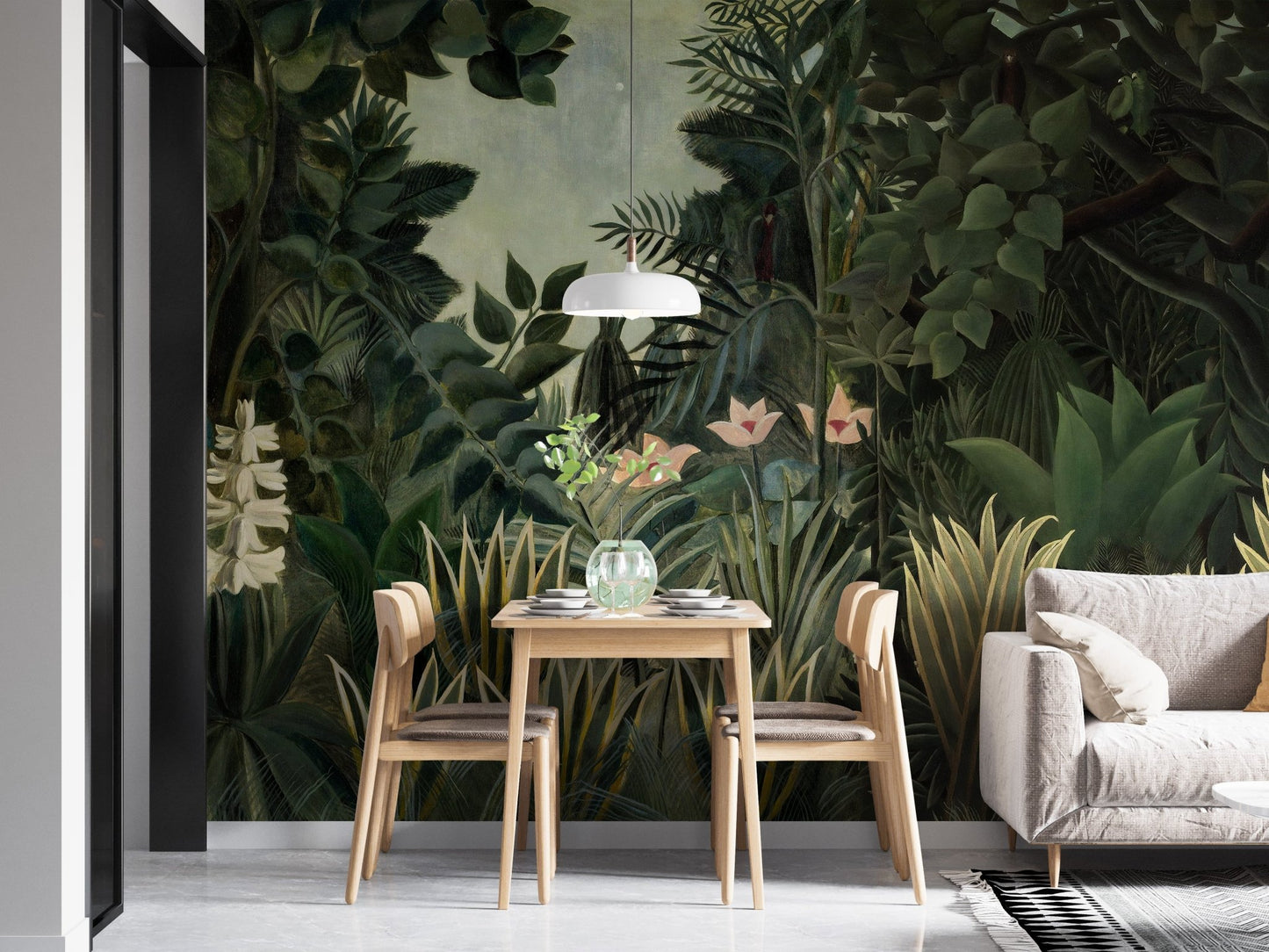 Tropical forest wall mural behind a wooden dining table and white lamp.