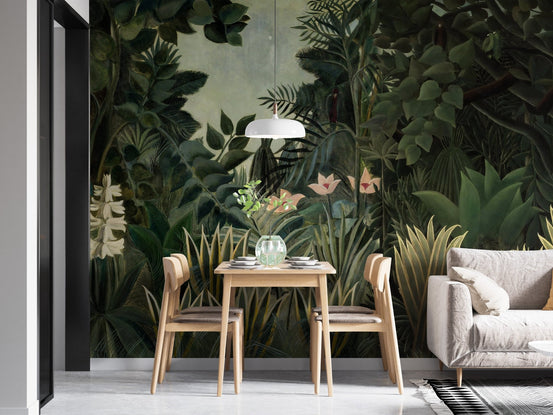 Tropical forest wall mural behind a wooden dining table and white lamp.