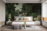 Deep green forest wall mural in a modern bedroom with grey bedding.