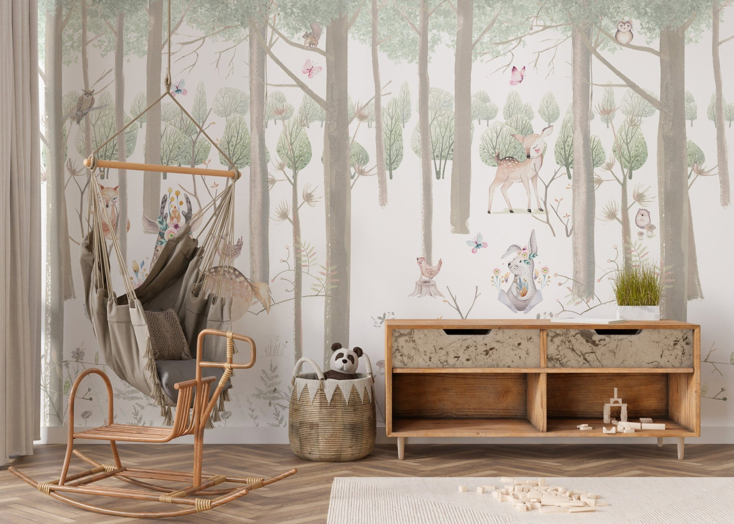 Nursery wall mural with forest animals and trees.