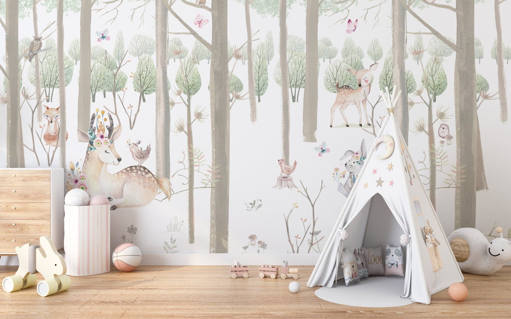 Playroom wall mural with trees and woodland animals.