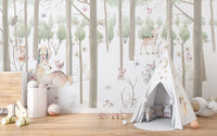 Playroom wall mural with trees and woodland animals.
