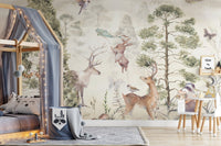 Wildlife animals and pine trees wall mural in a kids bedroom with grey tent.