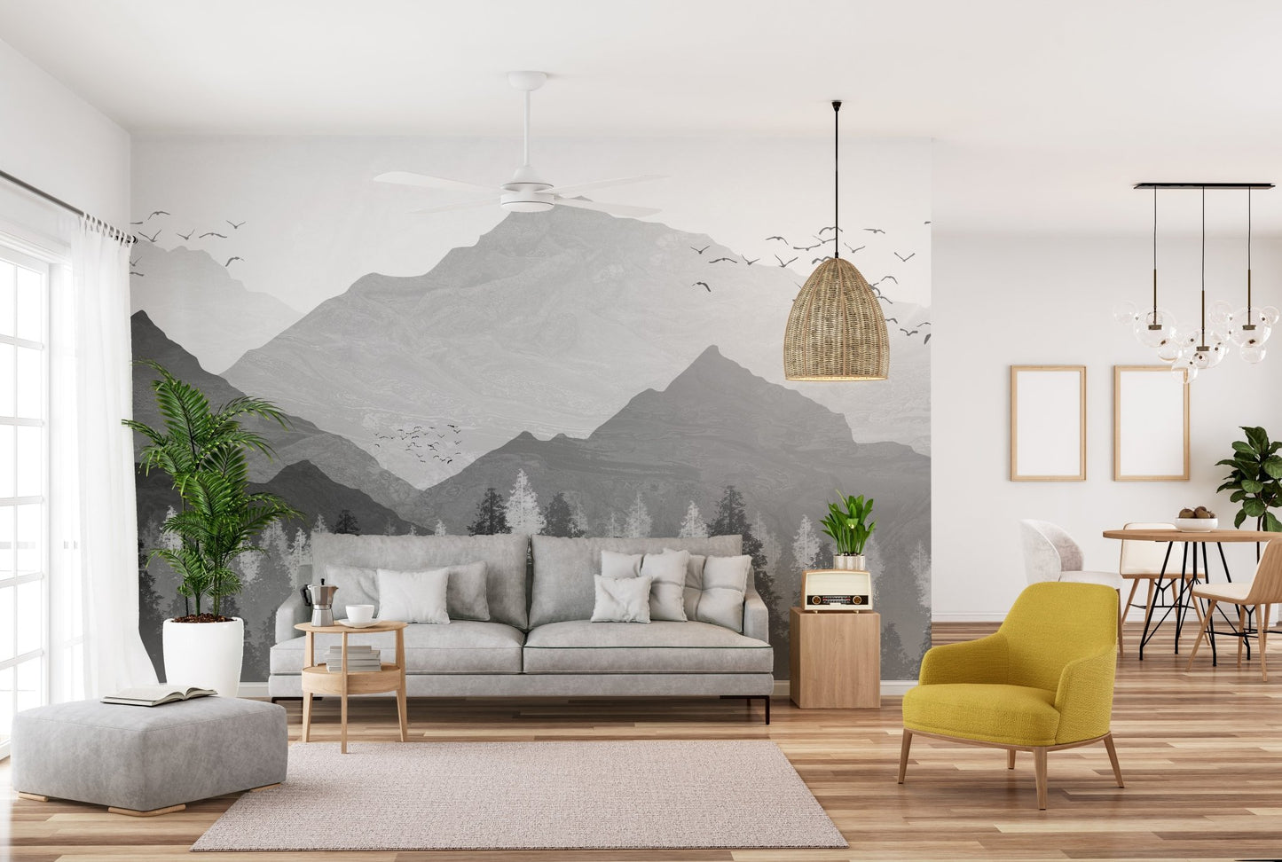 Modern open plan living space featuring a misty forest and mountain wall mural.