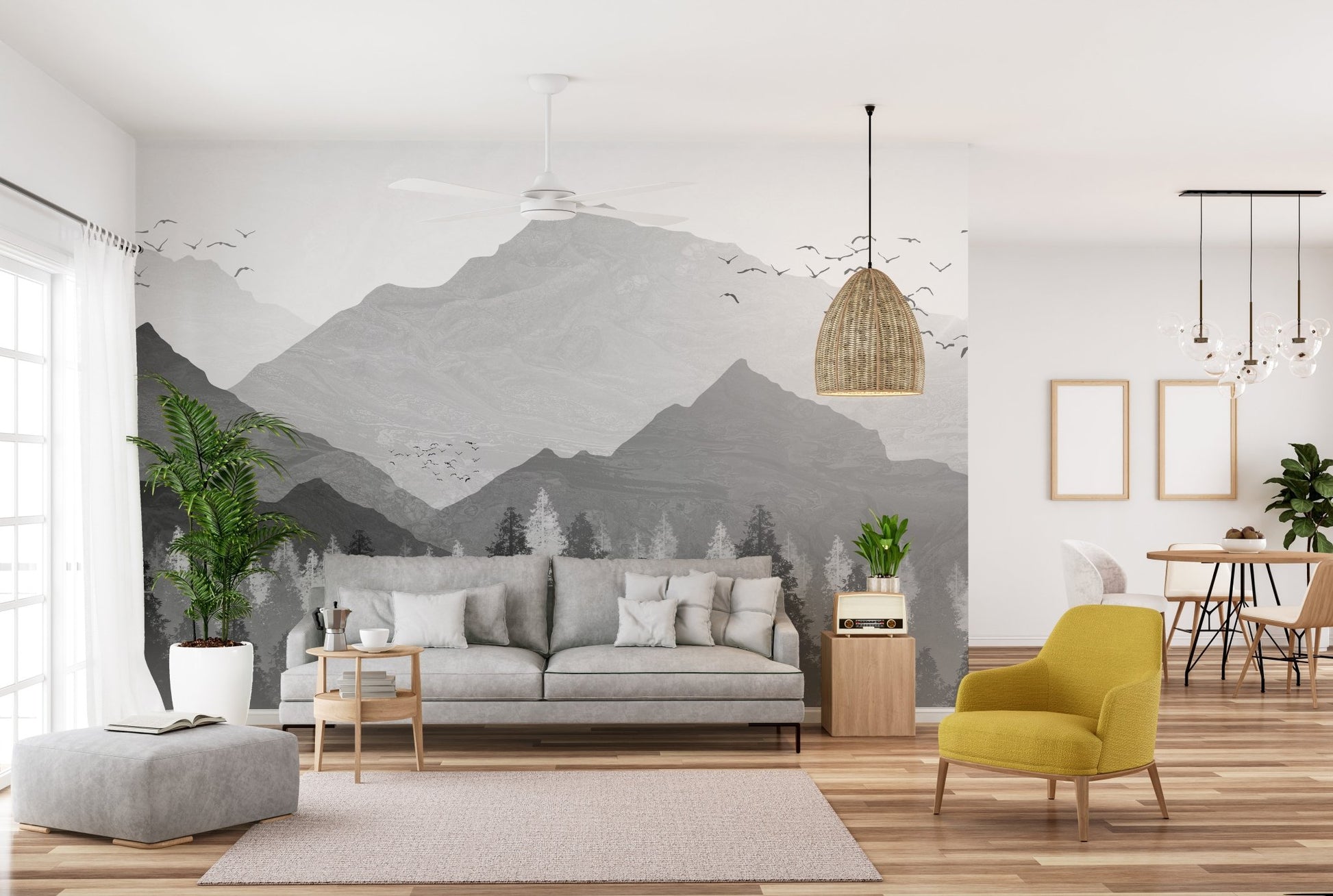 Modern open plan living space featuring a misty forest and mountain wall mural.