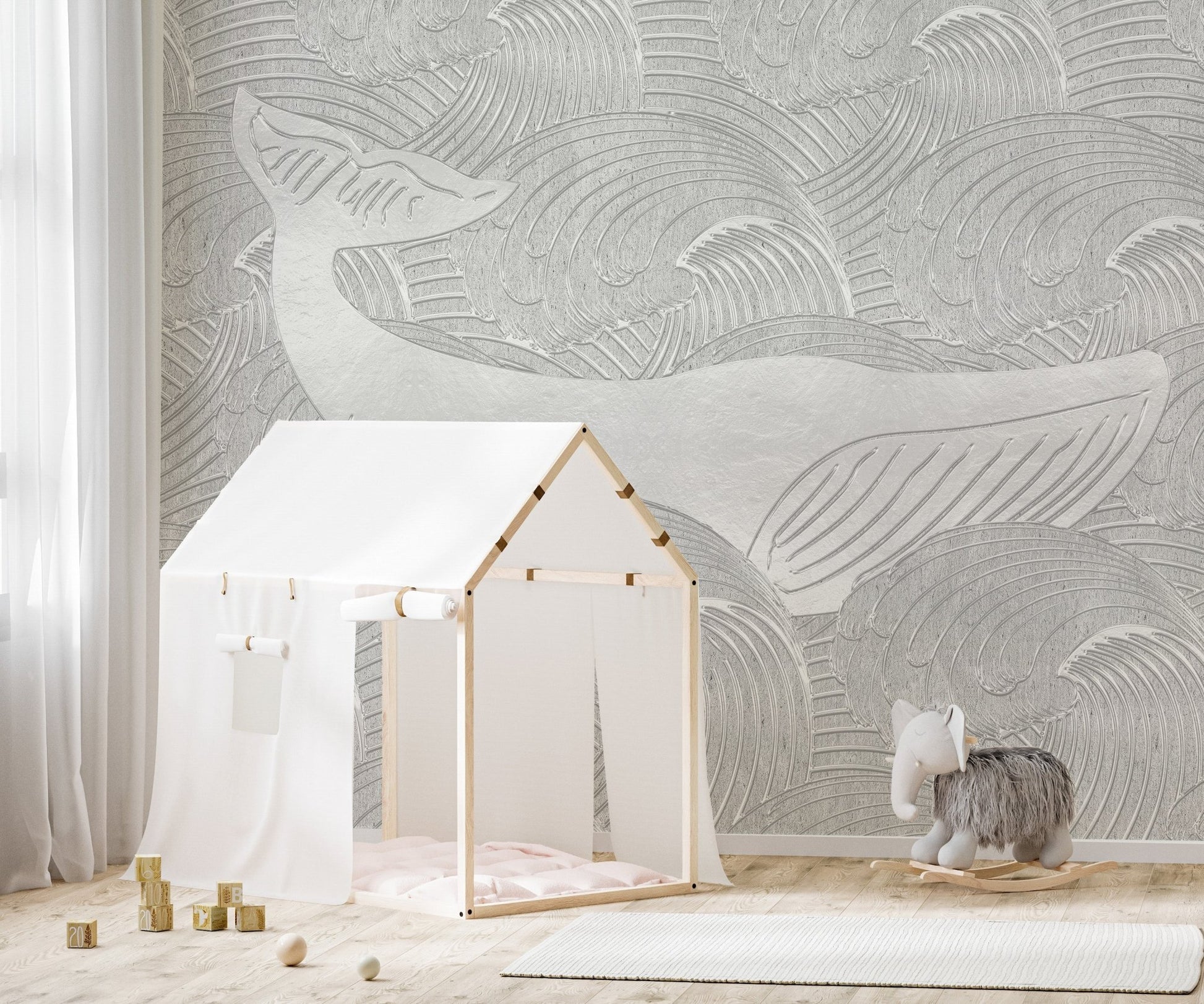 Silver Whale Handmade Wall Mural in a playroom with a wooden tent.