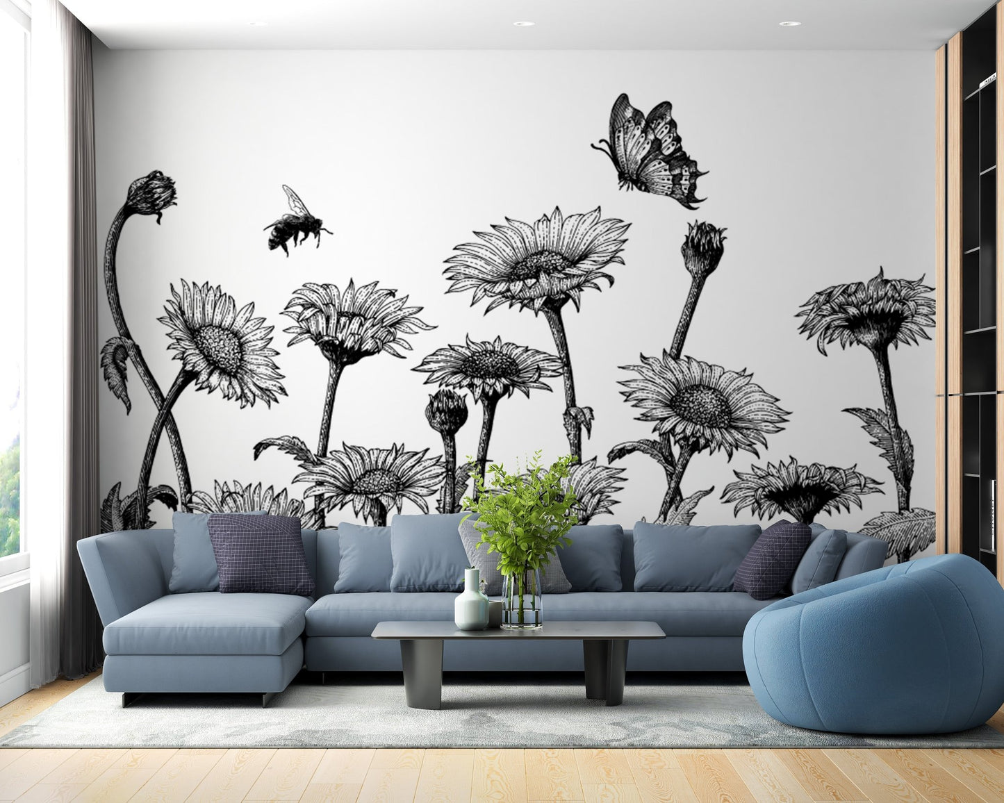 Sunflower field wall mural behind a blue couch and light wood flooring.