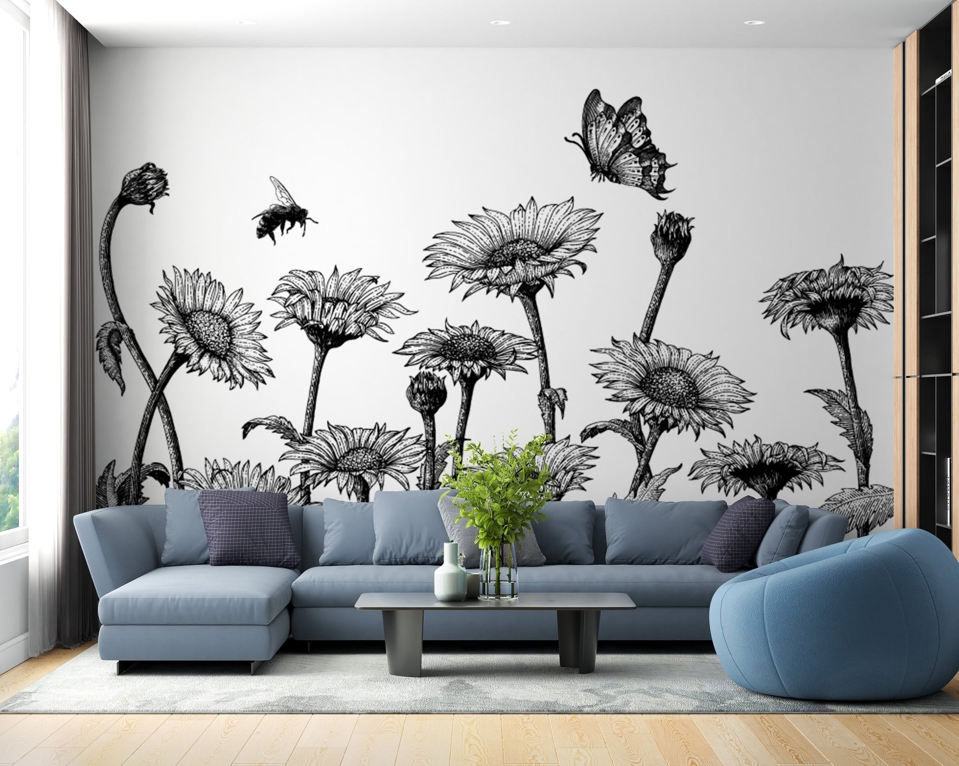 Sunflower field wall mural behind a blue couch and light wood flooring.