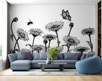 Sunflower field wall mural behind a blue couch and light wood flooring.