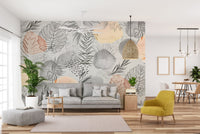 Sketched tropical leaves mural for stylish and natural living room interiors.
