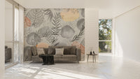 Minimalist tropical leaves mural with detailed hand-drawn designs in living space.