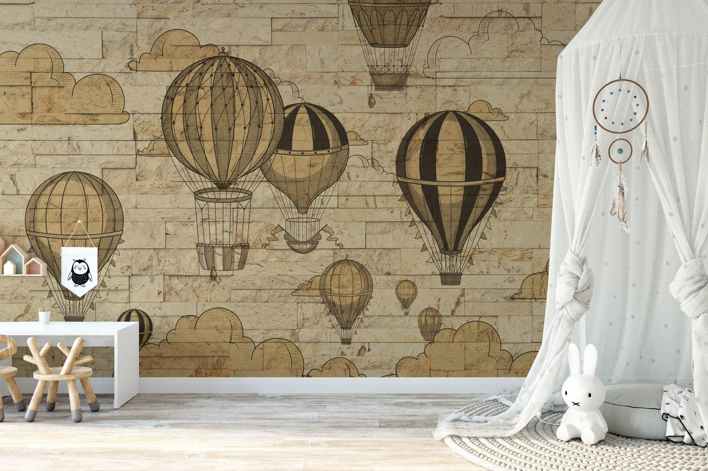 Hot air balloon mural capturing the charm of sky adventures in kids room with white tent.
