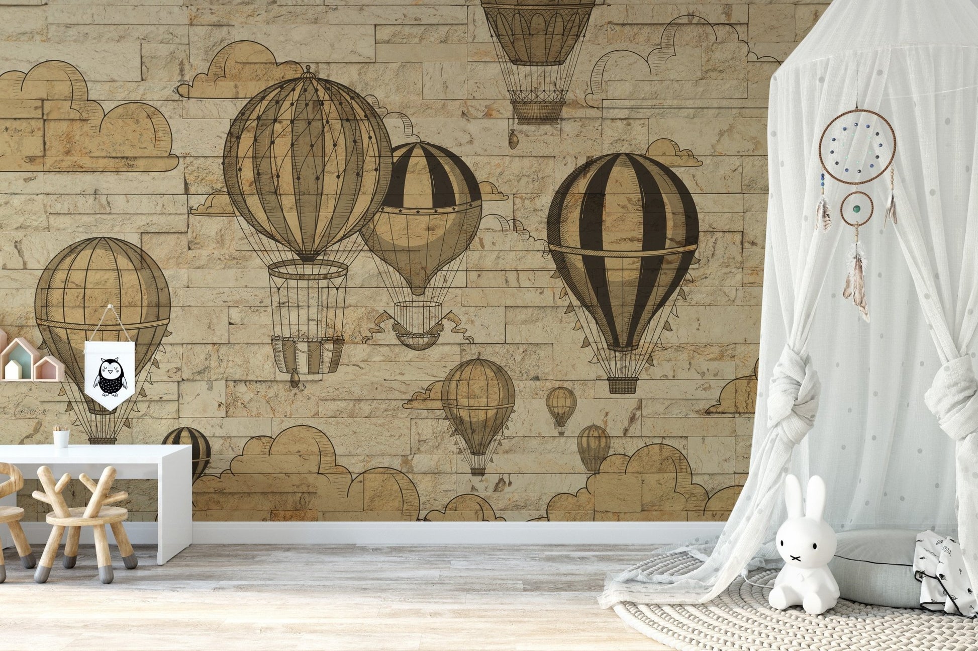 Hot air balloon mural capturing the charm of sky adventures in kids room with white tent.
