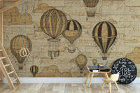 Wall mural featuring hot air balloons for adventurous children room decor.
