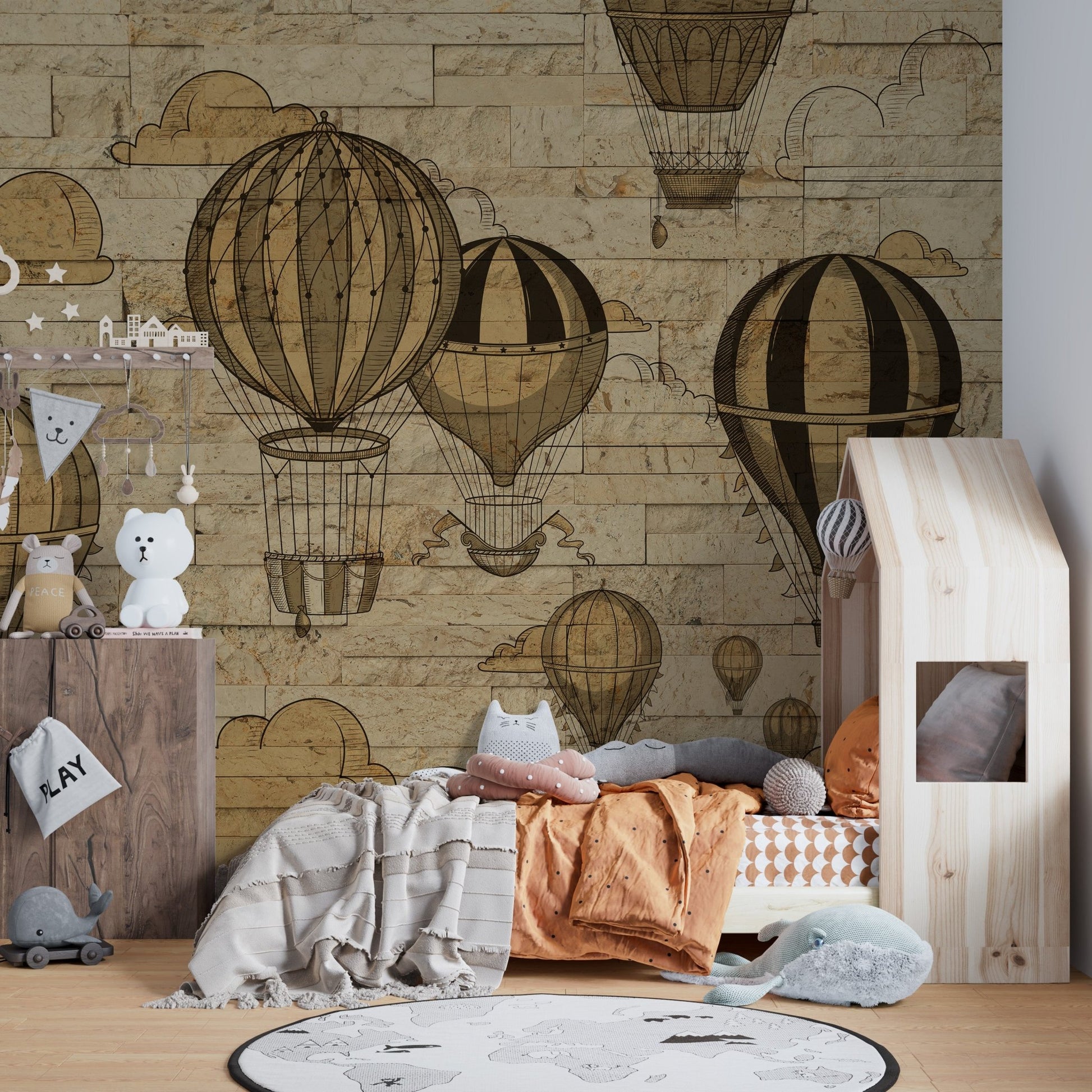 Colorful kids bedroom mural of hot air balloons soaring through the sky.
