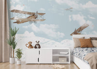 Cheerful sky adventures wall mural for kids' bedroom spaces.
