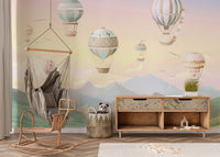 Airy pastel sky wallpaper featuring a hot air balloon fleet.