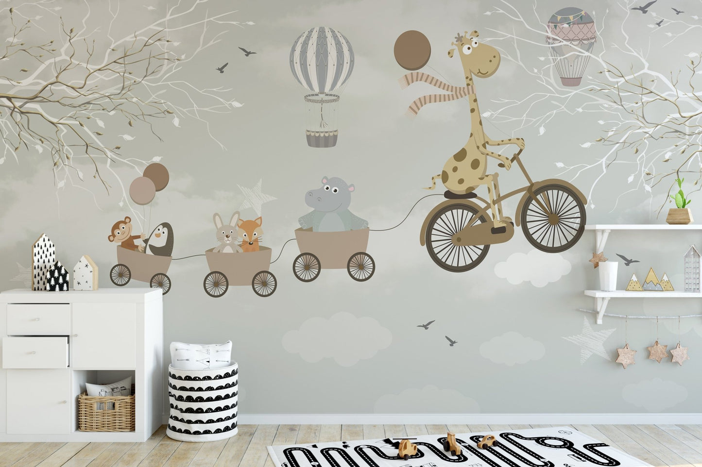 Whimsical animal train adventure wall mural in a bright playroom with wooden toy storage.