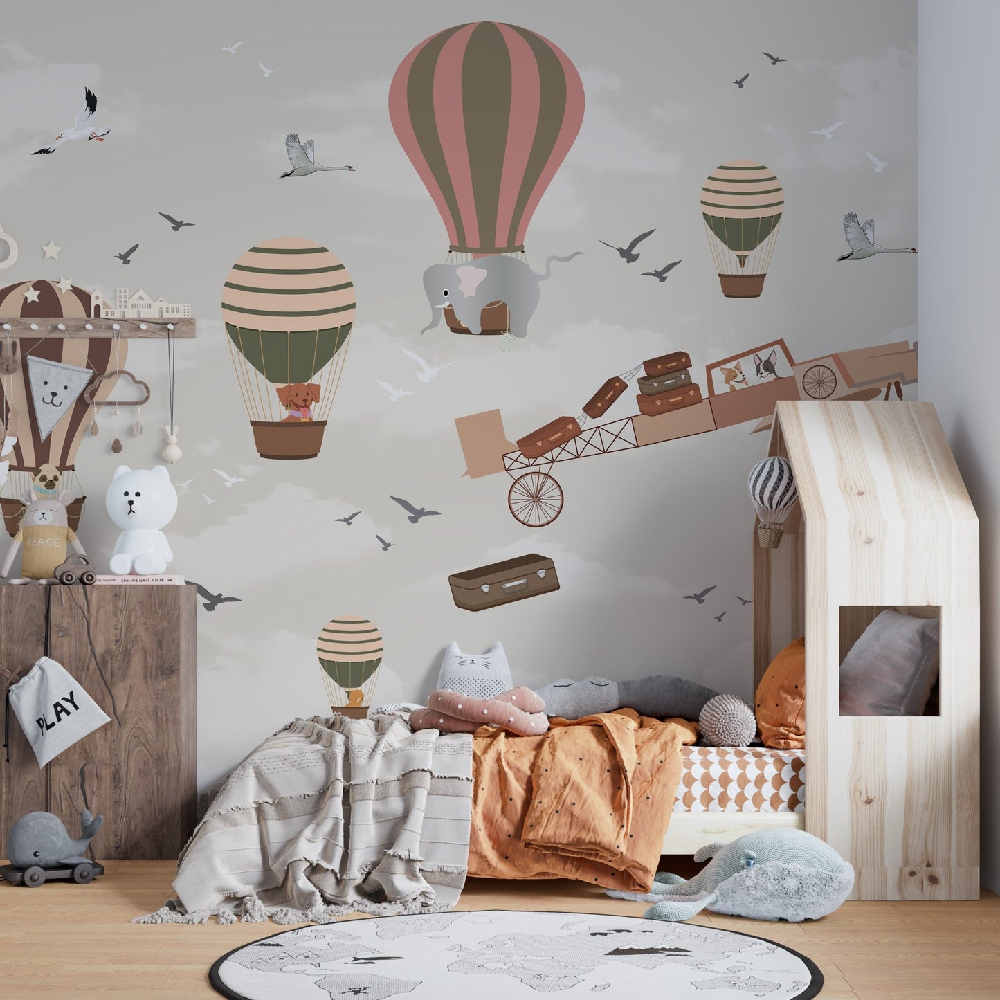 Sky safari wildlife mural adding energy to creative bedroom spaces.
