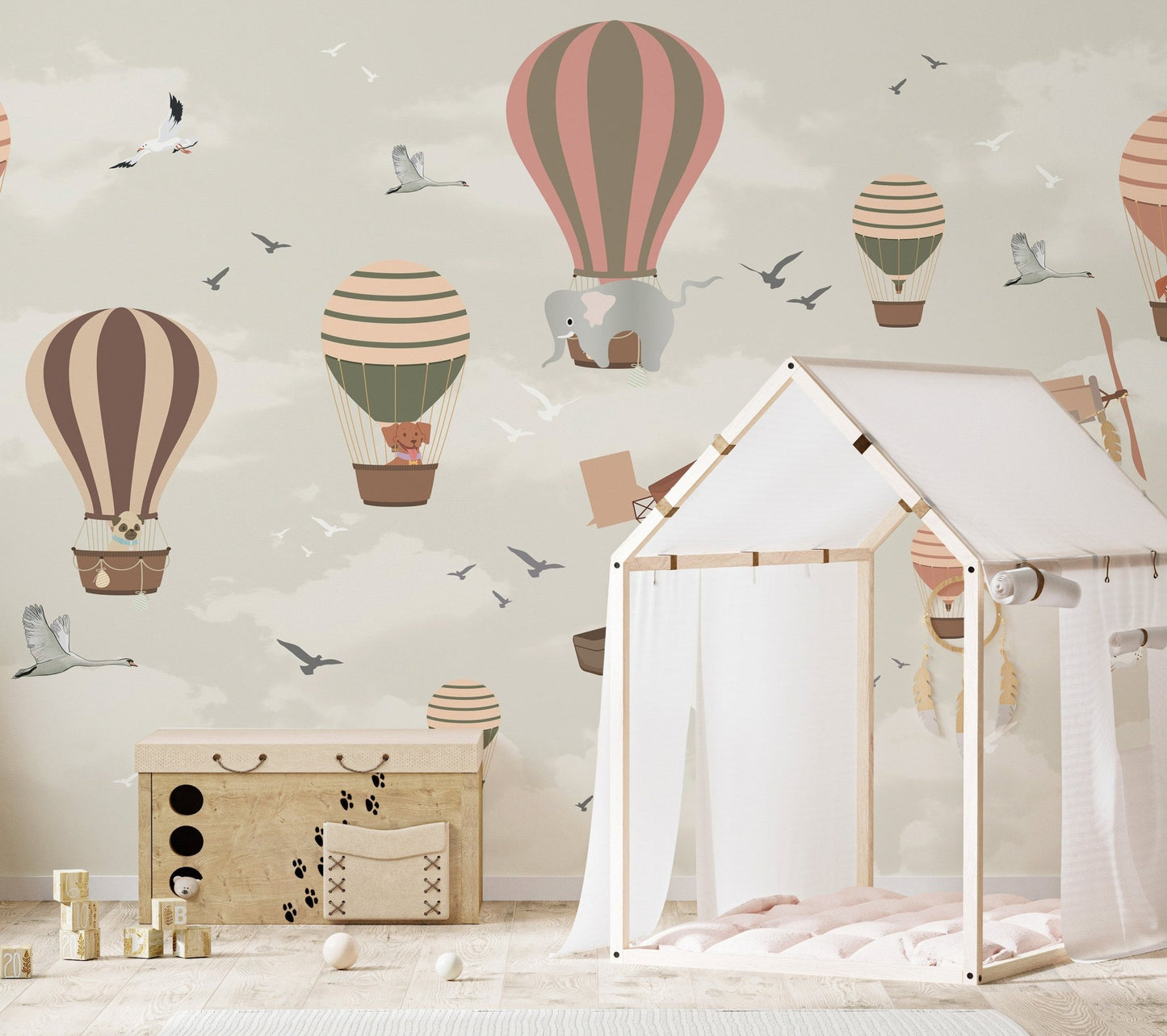 Sky safari wildlife mural for fun and dynamic nursery interiors.
