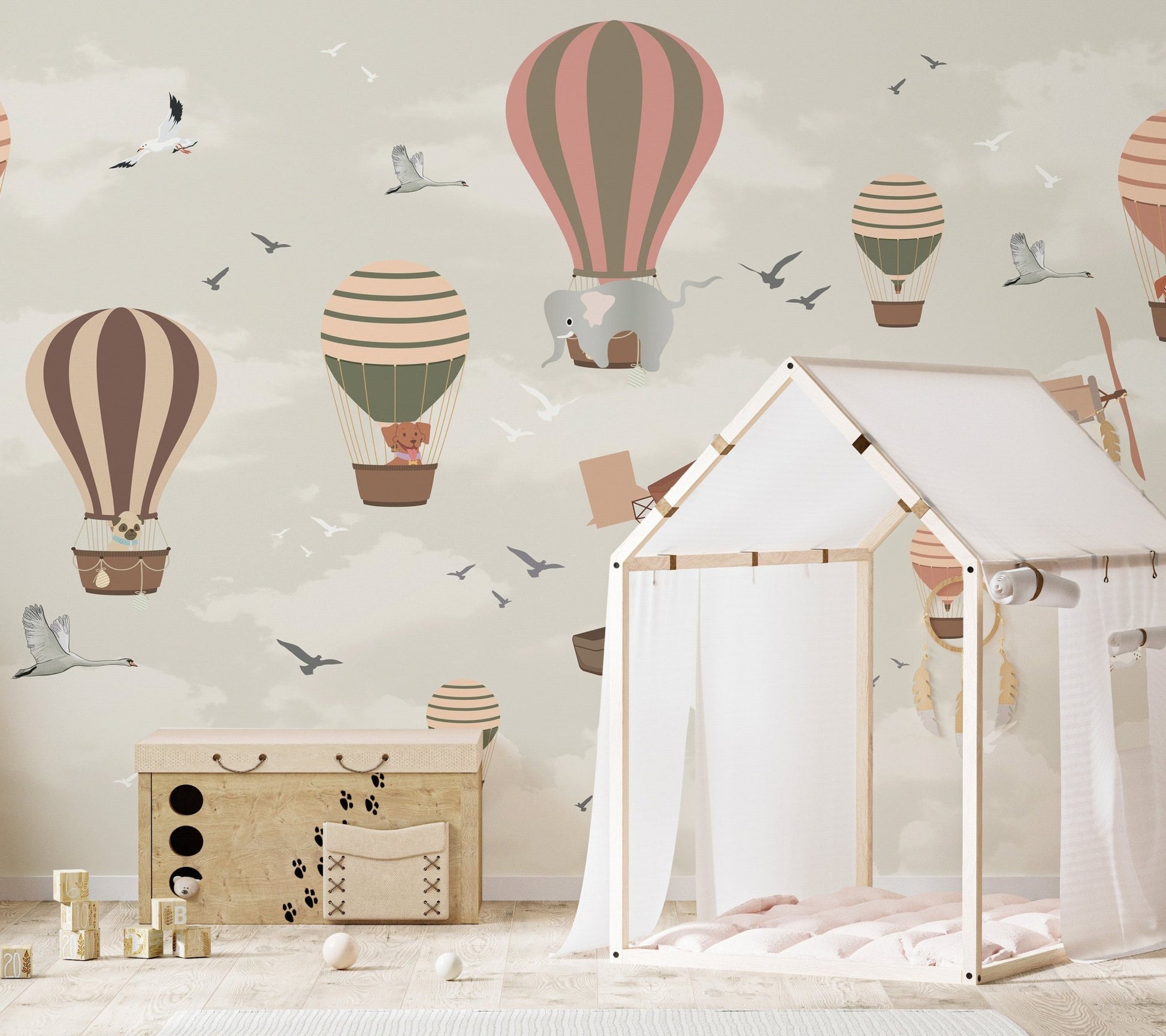 Sky safari wildlife mural for fun and dynamic nursery interiors.
