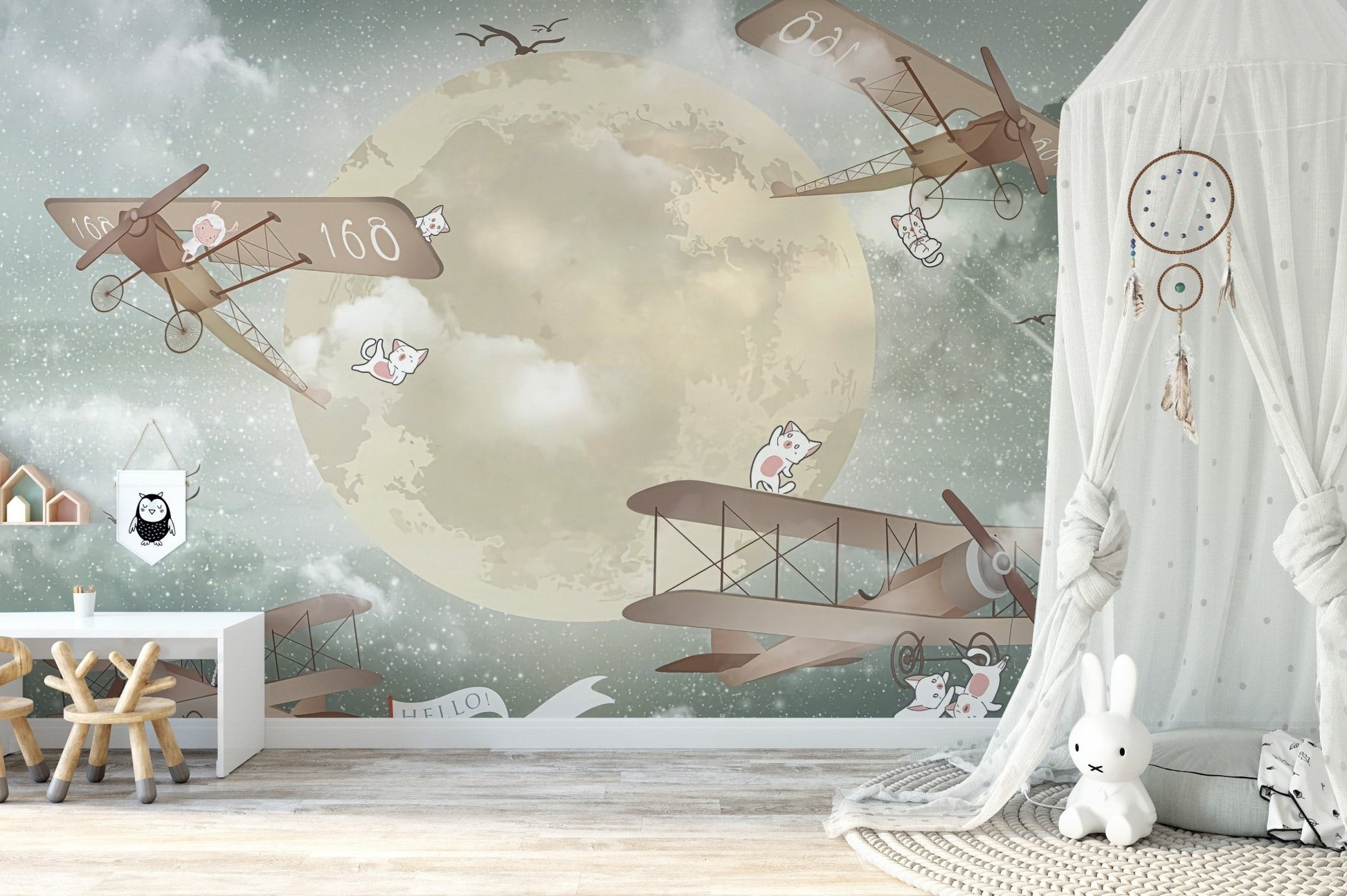 Sky gliders mural with a whimsical starry vibe in nursery.