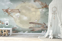 Sky gliders mural with a whimsical starry vibe in nursery.