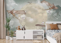 Modern bedroom featuring gliders and stars mural in a night sky theme