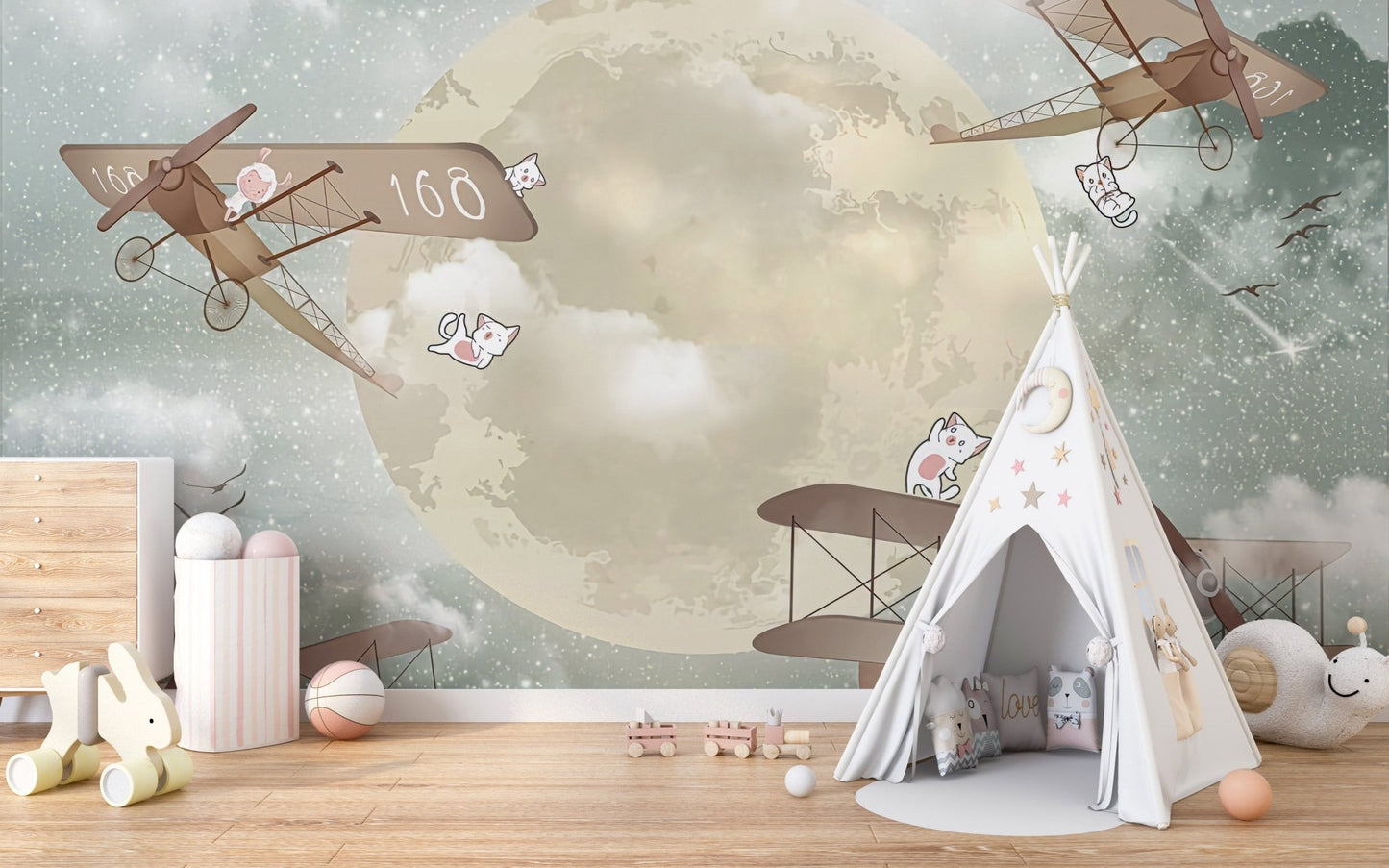 Skyward airplane wall mural behind white teepee tent in nursery.