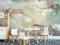 Kids dining room mural with gliders under a starlit sky.