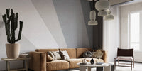 Sleek diagonal pattern wall mural in a living room featuring a brown leather couch.