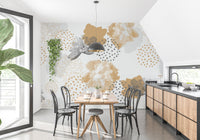 Minimalist dining area featuring a floral wall mural with mustard accents.