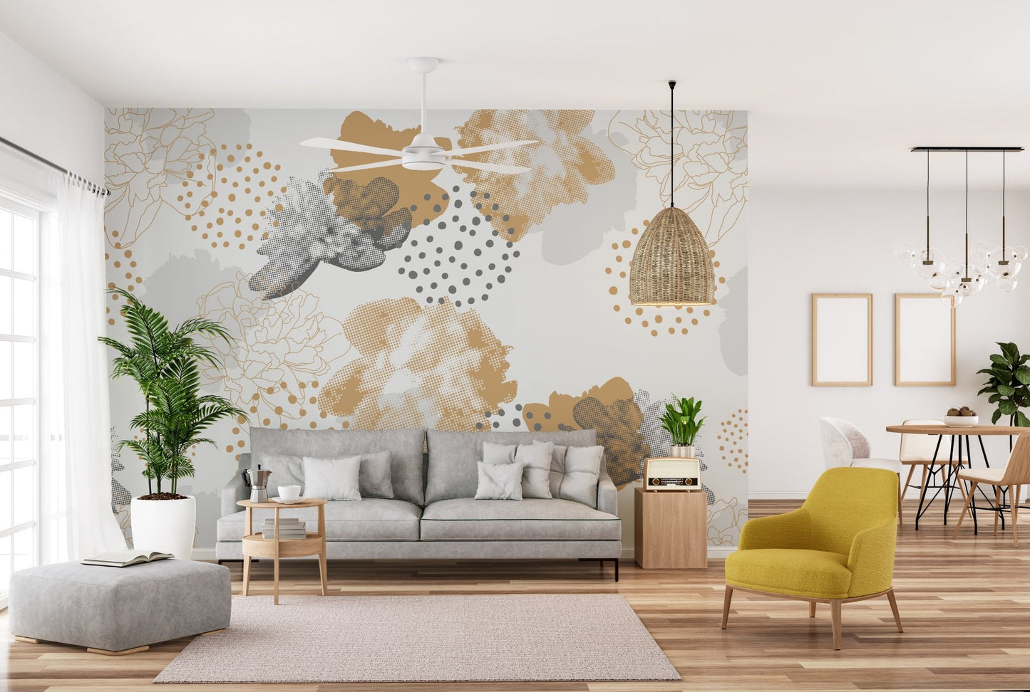 Abstract gold and grey floral wall mural behind a grey sofa in a living area.