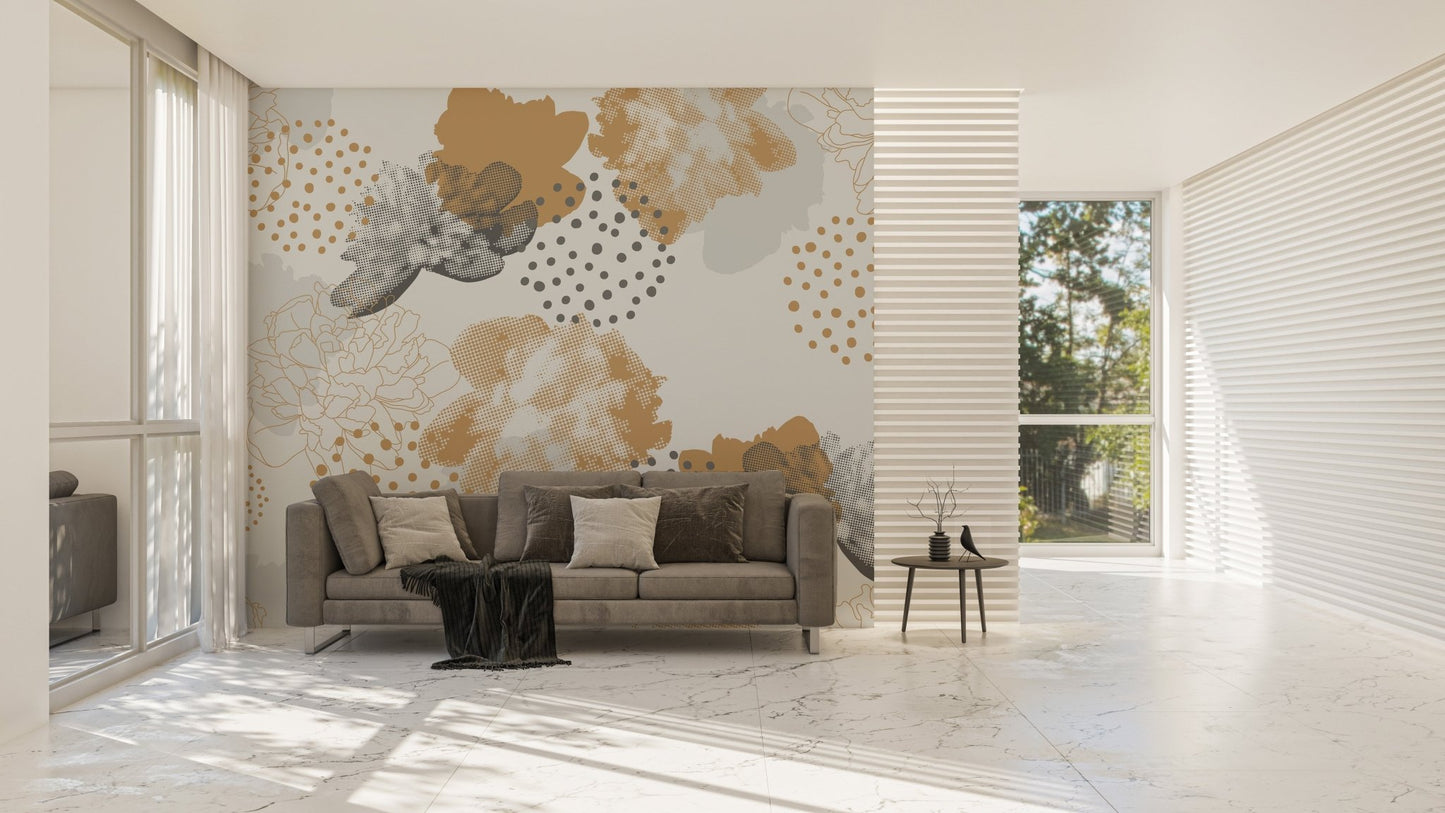Floral wall mural with gold leaf patterns in an open-plan apartment.