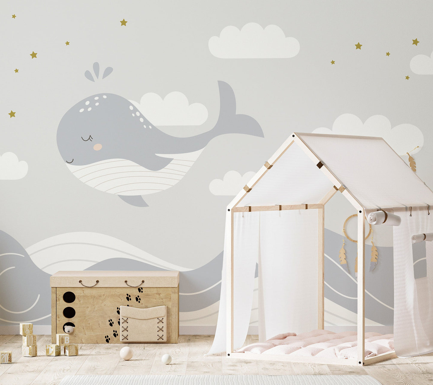 Modern nursery style whale wall mural in muted color tones.