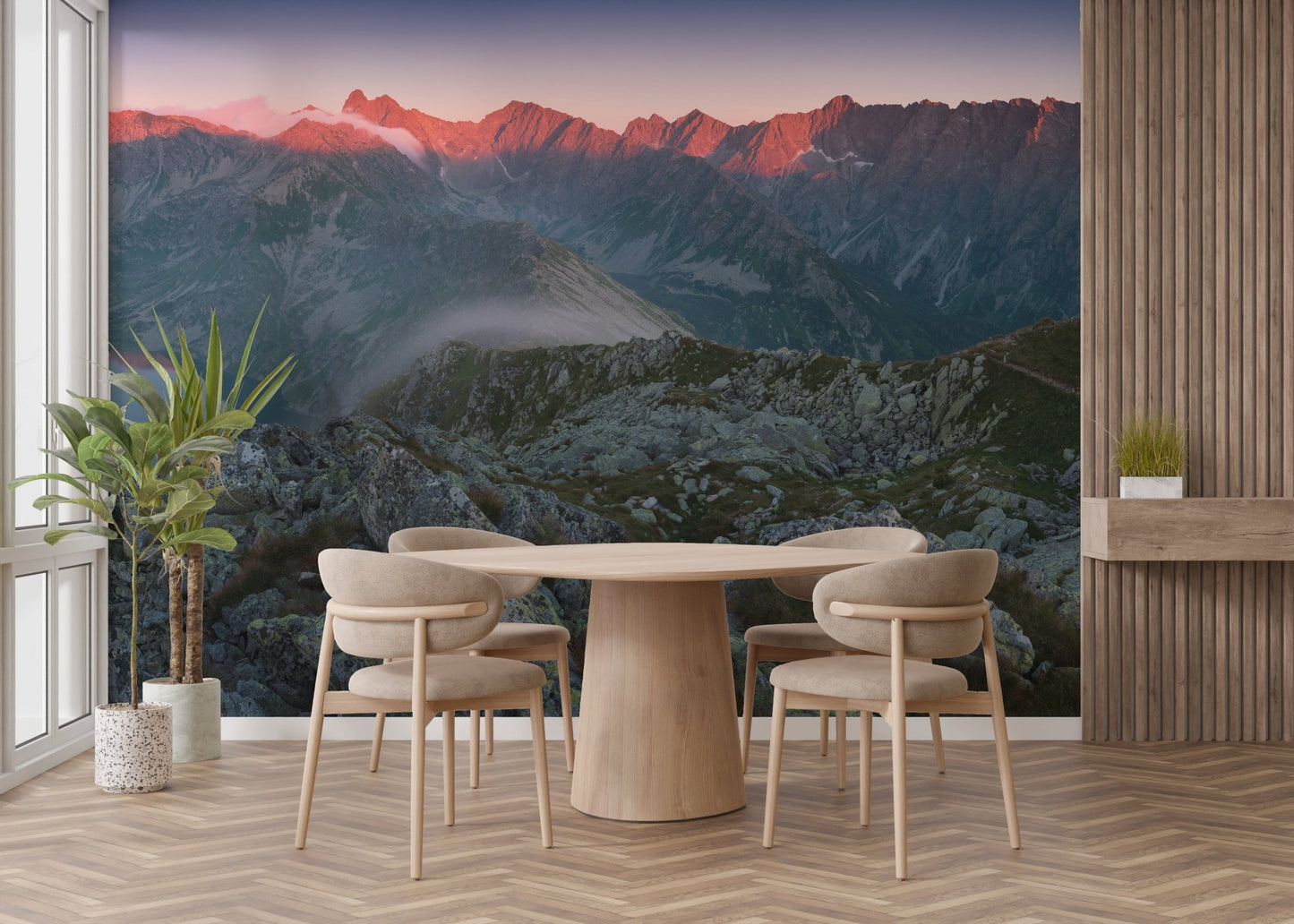 High altitude rocky mountain wall mural in a bright dining space