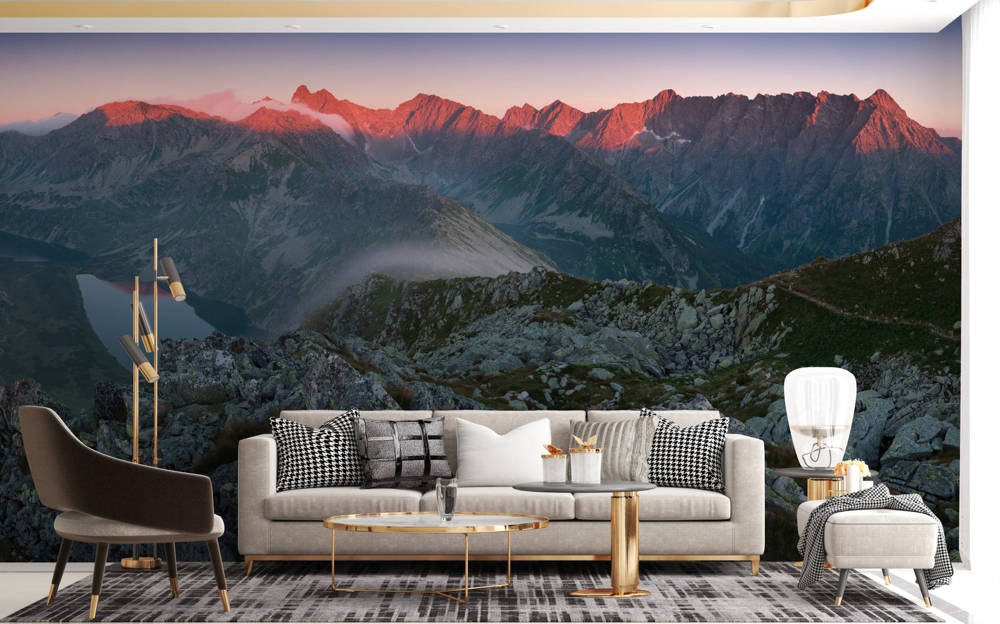 Grey and orange mountain wall mural in a living area with marble coffee table.