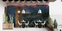 Slovakian Mountain Sunset Wall Mural in a cafe with white booth seating.