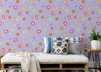 Colorful floral pattern with smiley blooms wallpaper.