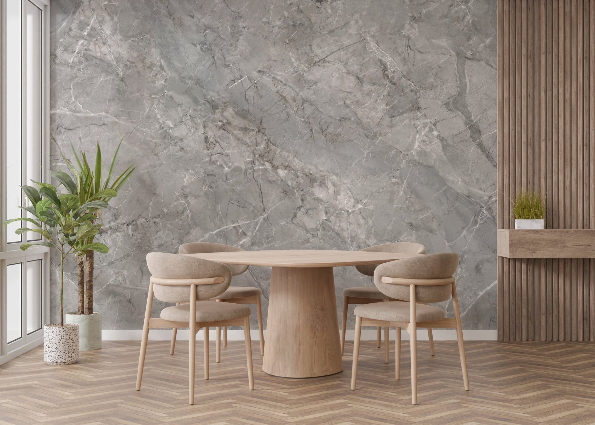 Large scale marble wall mural in a dining area with a round wooden table.