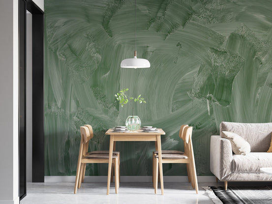 Smudge green board wall mural in a dining area with wooden table and chairs