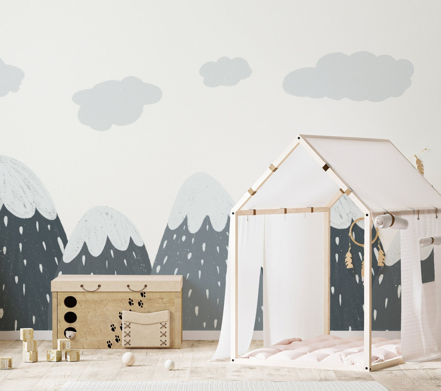 Kids room wall mural with grey mountains behind a white wooden house bed frame.