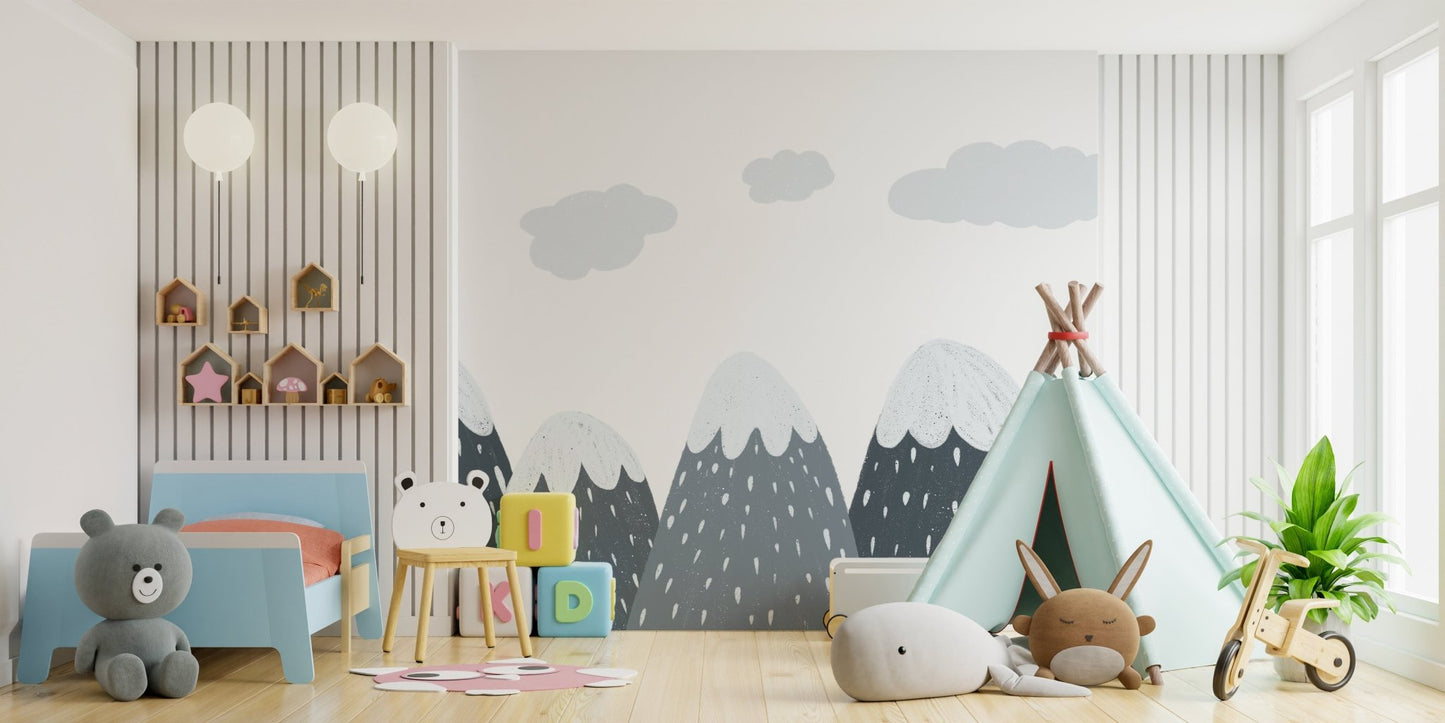 Mountain peak wall mural for a kids bedroom with natural wood furniture and toys.